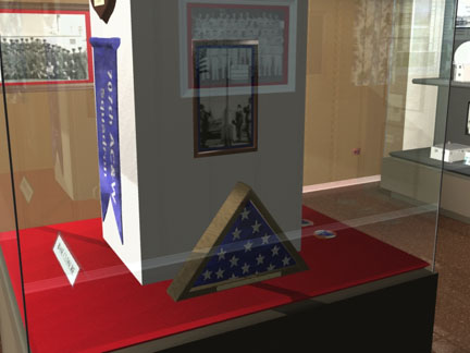 Museum case with the last flag flown over the squadron